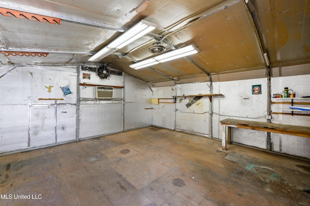 basement featuring a wall mounted AC