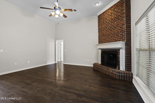 452 Pecan Cir, Brandon, MS 39042 - unfurnished living room with a ceiling fan, a brick fireplace, ornamental molding, and wood finished floors