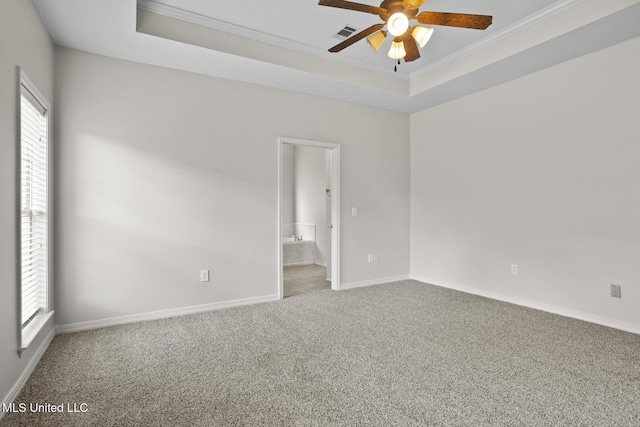 452 Pecan Cir, Brandon, MS 39042 - unfurnished room with crown molding, carpet, a ceiling fan, and a tray ceiling