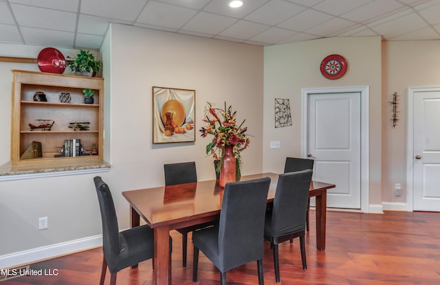 904 Northwood Cir, Brandon, MS 39047 - dining space featuring wood finished floors, baseboards, and a paneled ceiling
