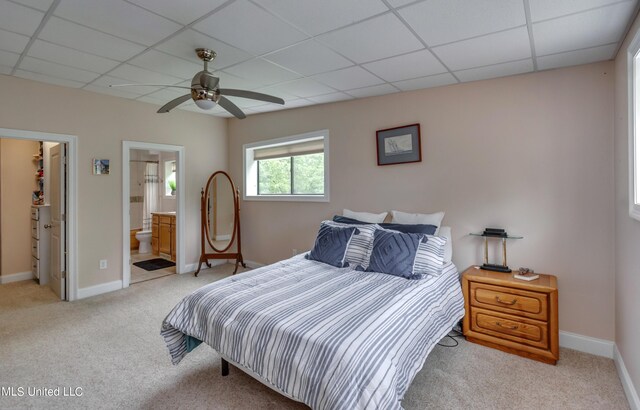 904 Northwood Cir, Brandon, MS 39047 - bedroom featuring a paneled ceiling, baseboards, light carpet, and connected bathroom