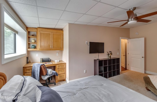 904 Northwood Cir, Brandon, MS 39047 - bedroom featuring a ceiling fan, baseboards, light colored carpet, and a drop ceiling