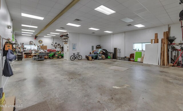 904 Northwood Cir, Brandon, MS 39047 - garage featuring a workshop area and visible vents