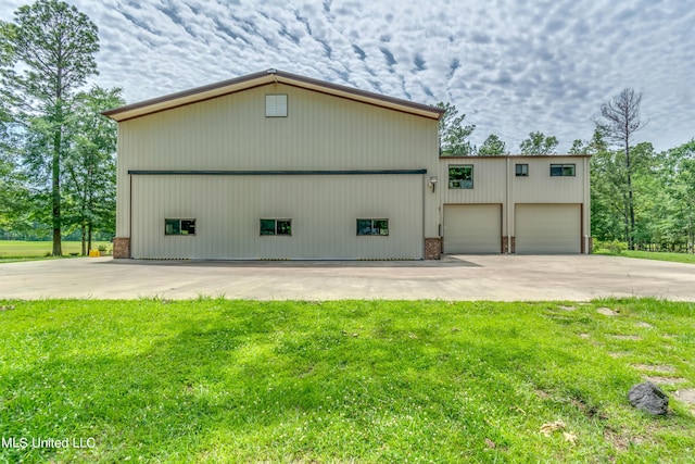 904 Northwood Cir, Brandon, MS 39047 - view of home's exterior featuring a yard and a garage