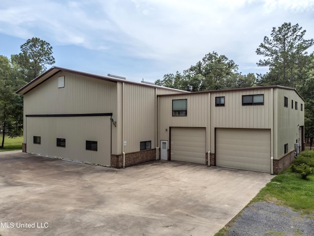 904 Northwood Cir, Brandon, MS 39047 - exterior space featuring a detached garage