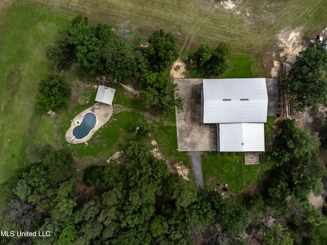 birds eye view of property with a rural view