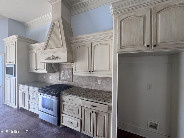 515 Belle Oak Pl, Brandon, MS 39042 - kitchen featuring stainless steel range with gas cooktop, crown molding, cream cabinets, stone counters, and tasteful backsplash