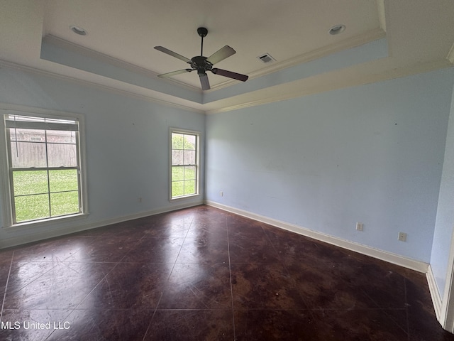 515 Belle Oak Pl, Brandon, MS 39042 - spare room featuring a tray ceiling, crown molding, a ceiling fan, and baseboards
