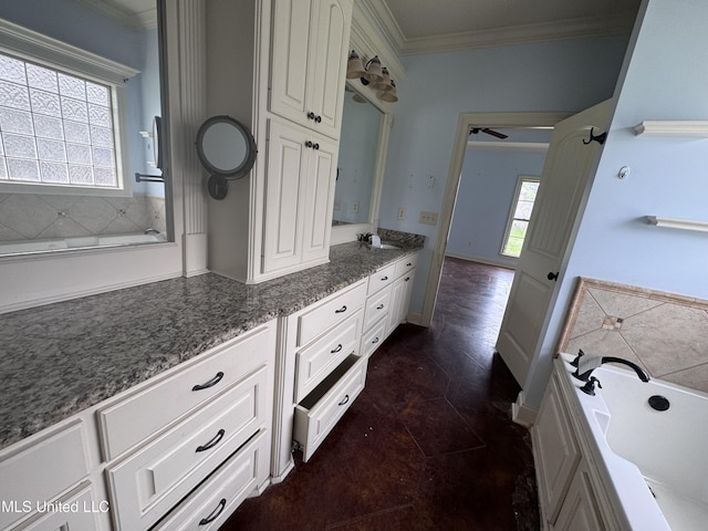 515 Belle Oak Pl, Brandon, MS 39042 - bathroom featuring ornamental molding, double vanity, and a garden tub