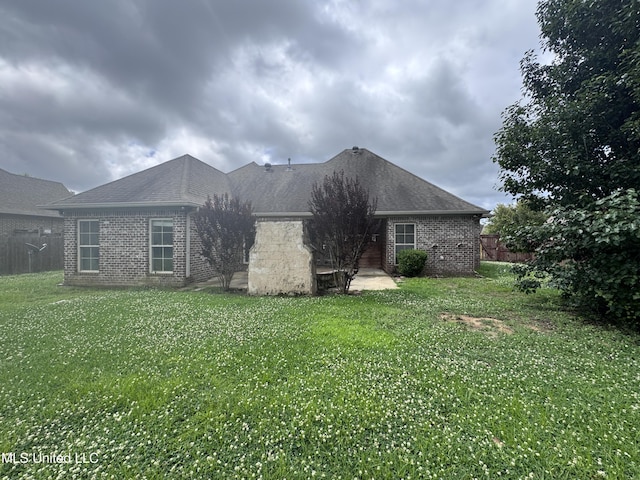 515 Belle Oak Pl, Brandon, MS 39042 - back of house with brick siding and roof with shingles