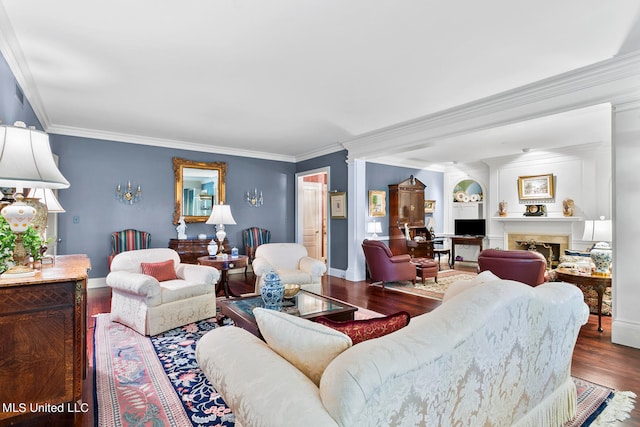 living room featuring hardwood / wood-style flooring and ornamental molding