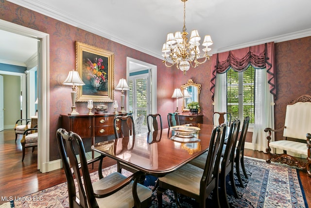 dining area with crown molding, wood-type flooring, a wealth of natural light, and an inviting chandelier