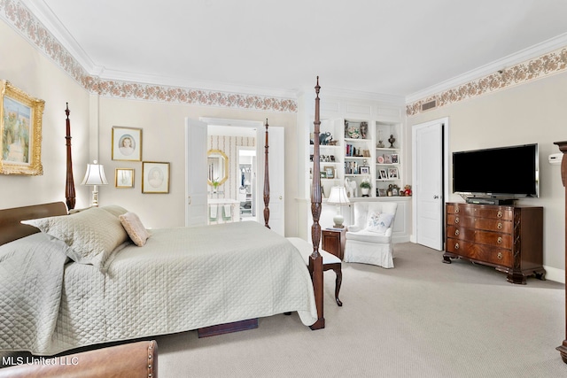 carpeted bedroom featuring crown molding