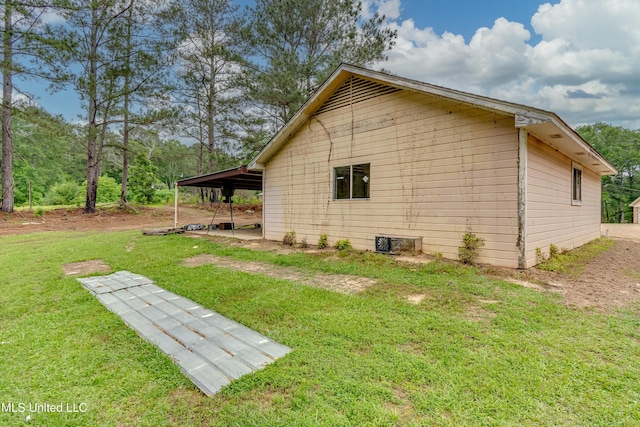 1597 Old Lake Rd, Brandon, MS 39042 - view of side of home with a yard
