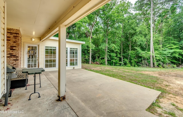 1597 Old Lake Rd, Brandon, MS 39042 - view of patio / terrace with a forest view
