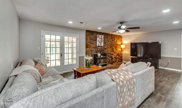 1597 Old Lake Rd, Brandon, MS 39042 - living area with a wood stove, dark wood-type flooring, a ceiling fan, recessed lighting, and french doors