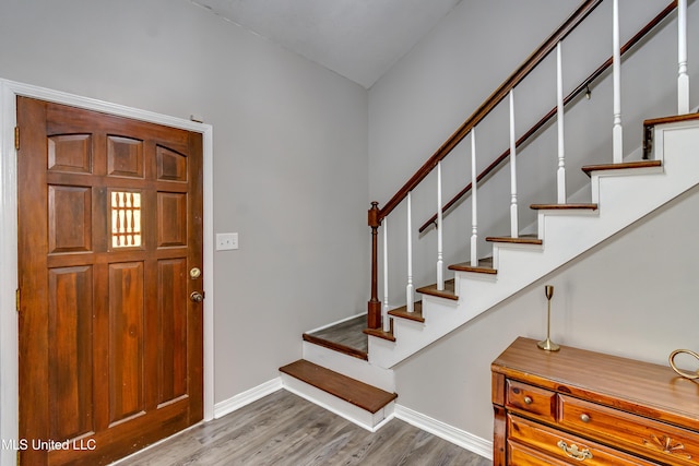 1597 Old Lake Rd, Brandon, MS 39042 - foyer entrance featuring baseboards, wood finished floors, and stairway