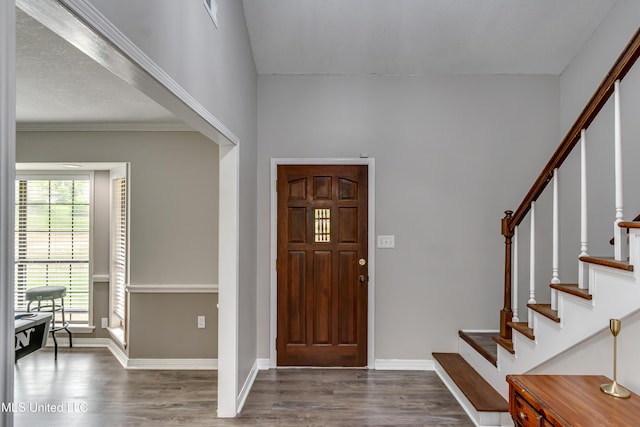 1597 Old Lake Rd, Brandon, MS 39042 - entrance foyer featuring wood finished floors, stairs, and baseboards
