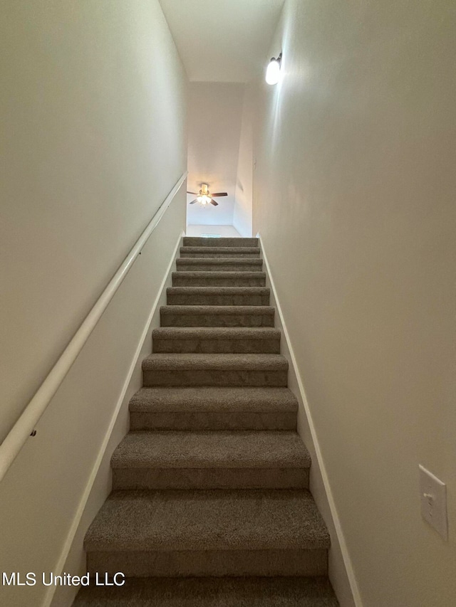 staircase with ceiling fan