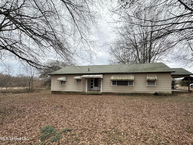 4513 Lawrence Hazel Rd, Lawrence, MS 39336 - view of front of home with metal roof and a carport