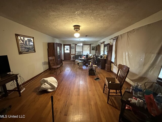 4513 Lawrence Hazel Rd, Lawrence, MS 39336 - living room featuring wood finished floors and a textured ceiling