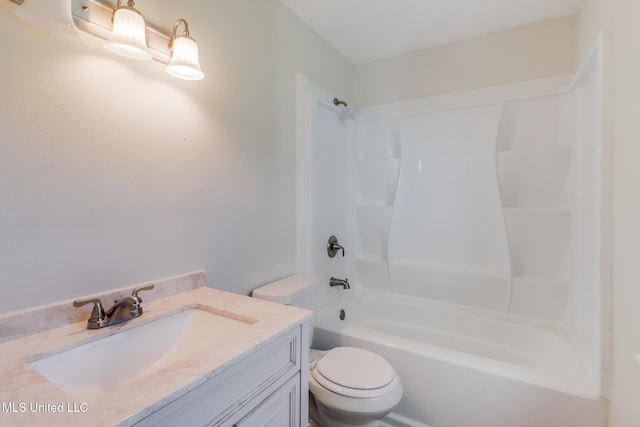 full bathroom with washtub / shower combination, vanity, and toilet