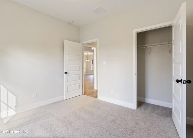 3752 Roland Dr, Southaven, MS 38672 - unfurnished bedroom featuring carpet floors, baseboards, and a closet