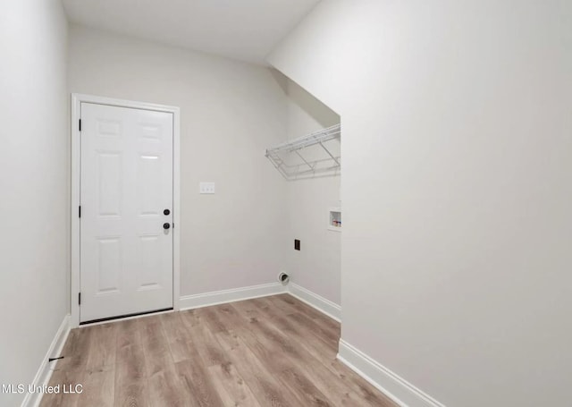 3752 Roland Dr, Southaven, MS 38672 - laundry room featuring light wood-style flooring, baseboards, and hookup for a washing machine
