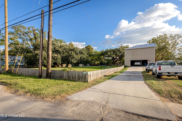 view of side of home featuring a lawn