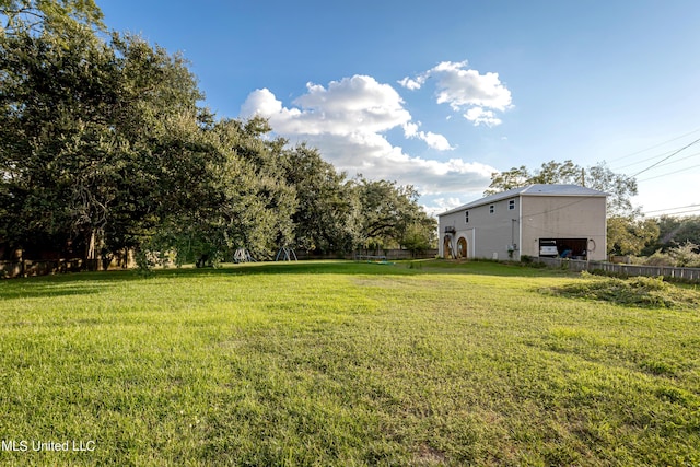 view of yard featuring fence
