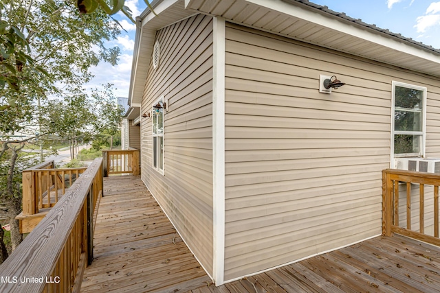 view of home's exterior with a deck
