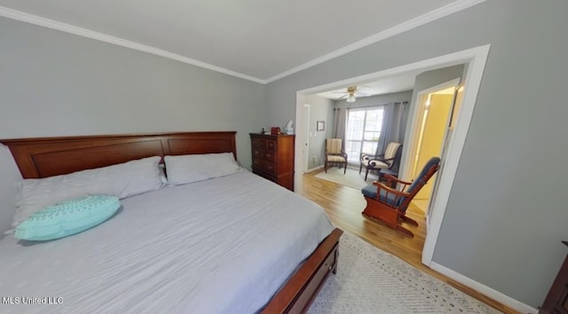 269 Weecama Dr, Ferriday, LA 71334 - bedroom featuring light wood-style flooring, crown molding, and baseboards