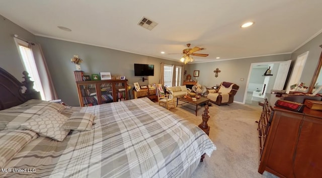 269 Weecama Dr, Ferriday, LA 71334 - bedroom with crown molding, light carpet, visible vents, and multiple windows