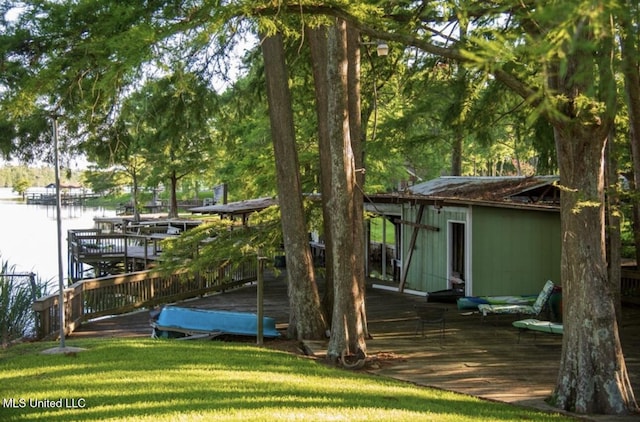 269 Weecama Dr, Ferriday, LA 71334 - exterior space with a lawn and a deck with water view