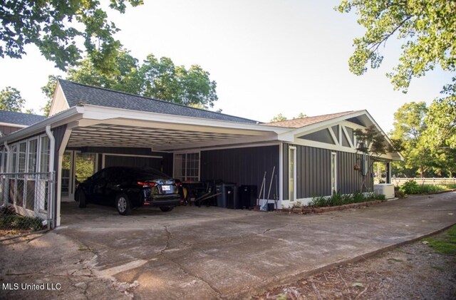 269 Weecama Dr, Ferriday, LA 71334 - view of parking / parking lot with driveway and an attached carport