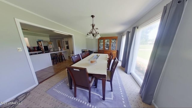 269 Weecama Dr, Ferriday, LA 71334 - dining area featuring a wealth of natural light and a notable chandelier