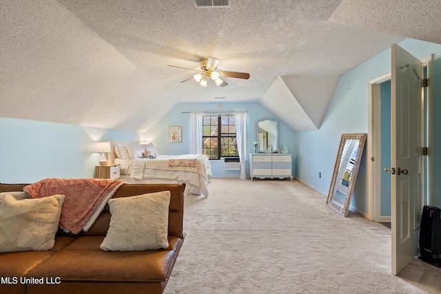 carpeted bedroom featuring a textured ceiling, ceiling fan, and lofted ceiling