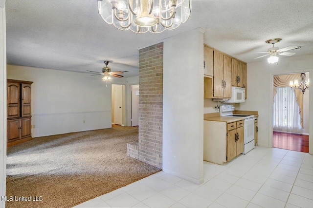 kitchen featuring white appliances, light carpet, a textured ceiling, and ceiling fan with notable chandelier