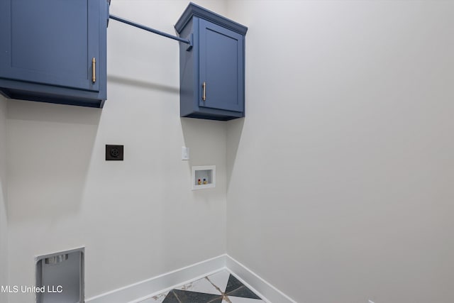 clothes washing area featuring cabinets, washer hookup, and electric dryer hookup