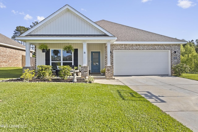 craftsman house featuring board and batten siding, roof with shingles, a front lawn, concrete driveway, and an attached garage