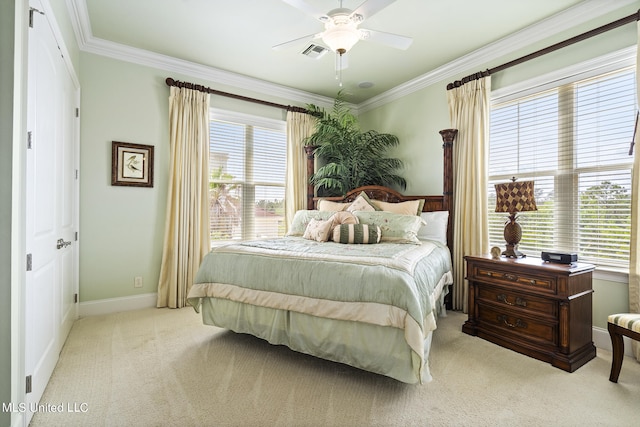 bedroom with light carpet, crown molding, multiple windows, and ceiling fan