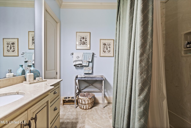 bathroom featuring vanity and ornamental molding