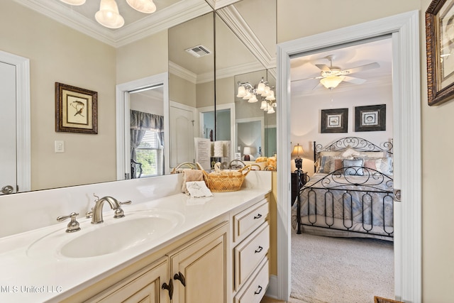 bathroom with vanity, ornamental molding, and ceiling fan