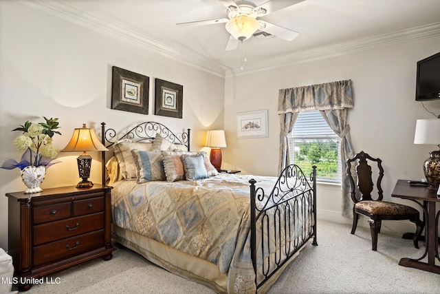 carpeted bedroom with ornamental molding and ceiling fan