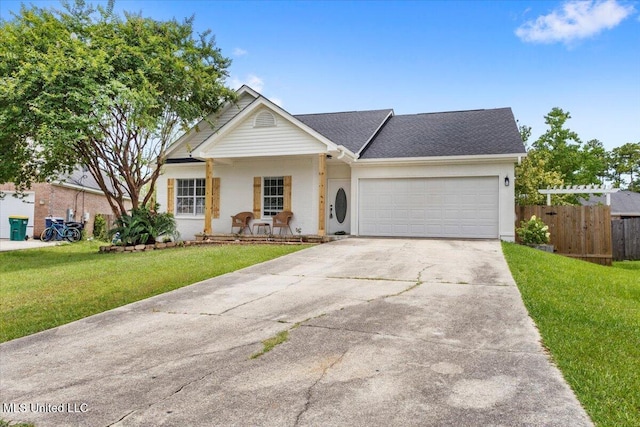 14789 Nassau Dr, Biloxi, MS 39532 - view of front of house featuring concrete driveway, an attached garage, a shingled roof, and a porch
