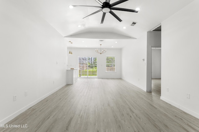 14789 Nassau Dr, Biloxi, MS 39532 - unfurnished living room featuring a chandelier, recessed lighting, ceiling fan, light wood finished floors, and vaulted ceiling