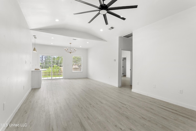 14789 Nassau Dr, Biloxi, MS 39532 - unfurnished living room featuring a chandelier, light wood-style flooring, a ceiling fan, recessed lighting, and lofted ceiling