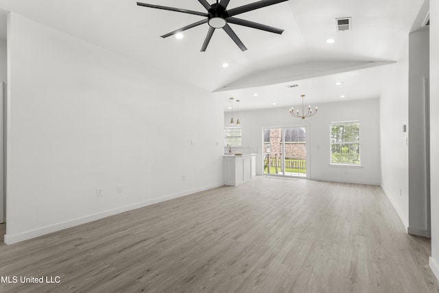 14789 Nassau Dr, Biloxi, MS 39532 - unfurnished living room with light wood-style floors, ceiling fan, recessed lighting, a chandelier, and vaulted ceiling