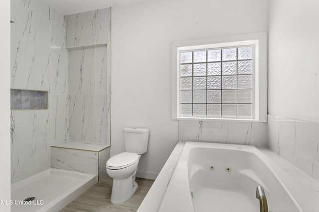 14789 Nassau Dr, Biloxi, MS 39532 - bathroom featuring a whirlpool tub and wood finished floors