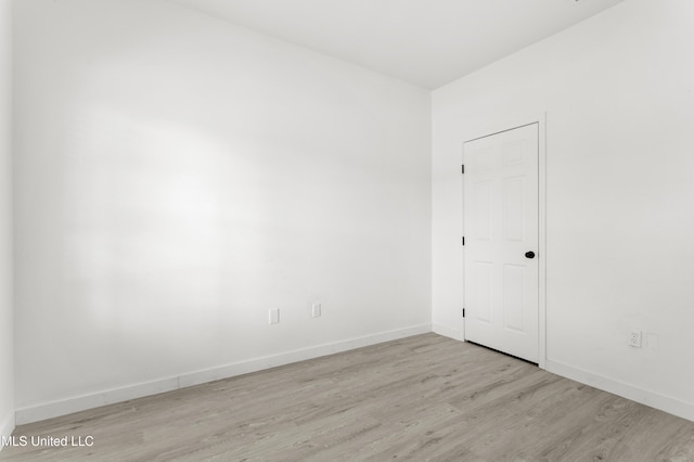 14789 Nassau Dr, Biloxi, MS 39532 - unfurnished room with light wood-type flooring and baseboards